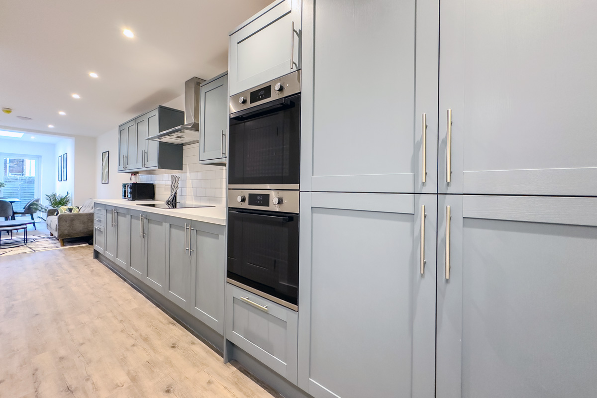 Modern fitted kitchen installation by SODA Building Services Ltd