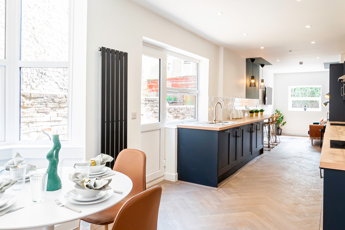 Completed HMO renovation with modern kitchen and dining area by SODA Building Services Ltd